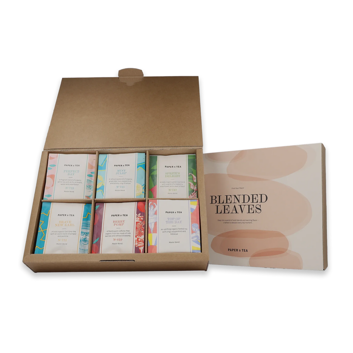 Offene Box mit acht farbenfrohen, einzigartig verpackten Bio-Tees von PAPER & TEA und Blended Leaves Flyer.