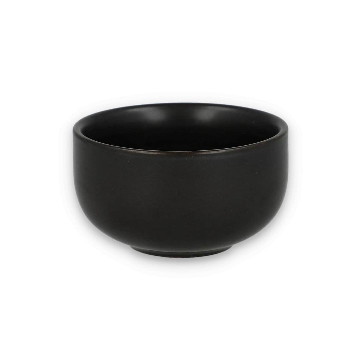 Mattierte schwarze Keramikschale mit glatter, abgerundeter Form auf schwarzem Hintergrund.